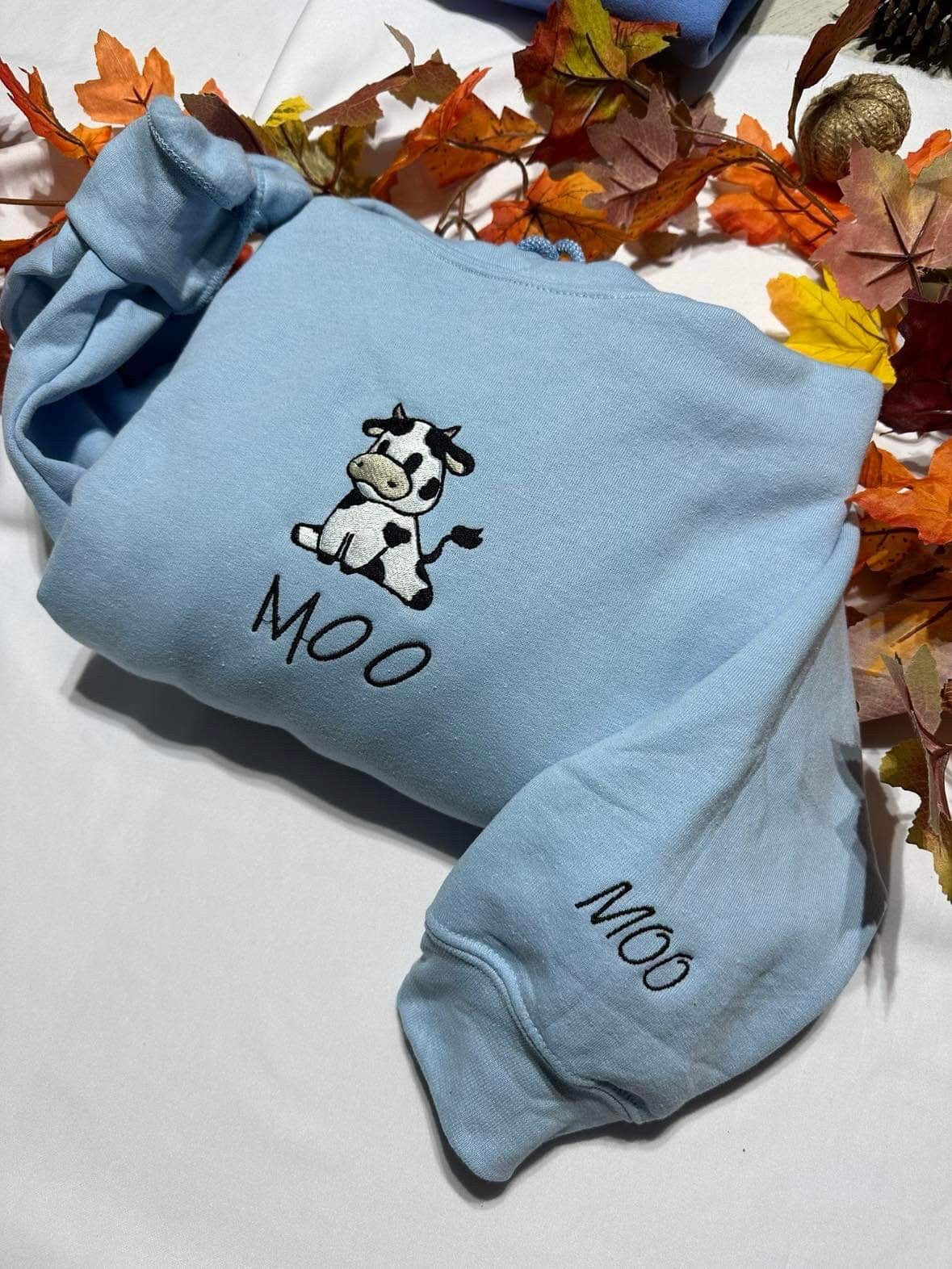Cow embroidered hoodie;  Sitting cow with MOO embroidered on the cuff of the hoodie, Fall hoodies