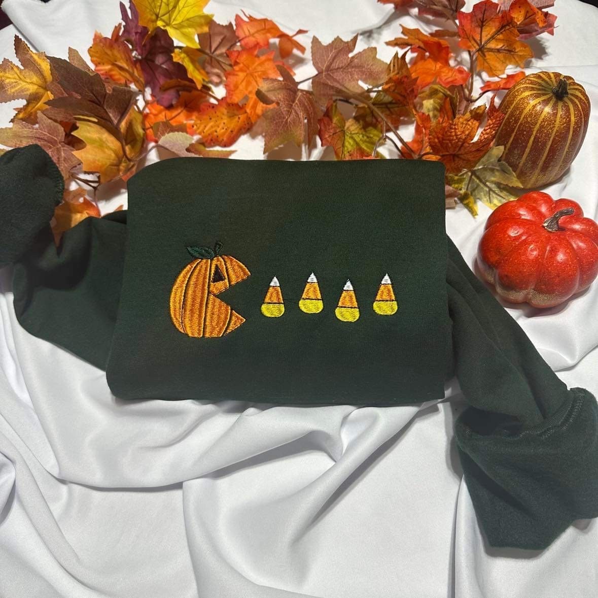 Pumpkin Eating Candy Corn Embroidered Sweatshirt: Thanksgiving Gift