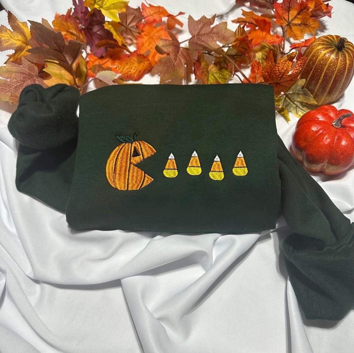 Pumpkin Eating Candy Corn Embroidered Sweatshirt: Thanksgiving Gift