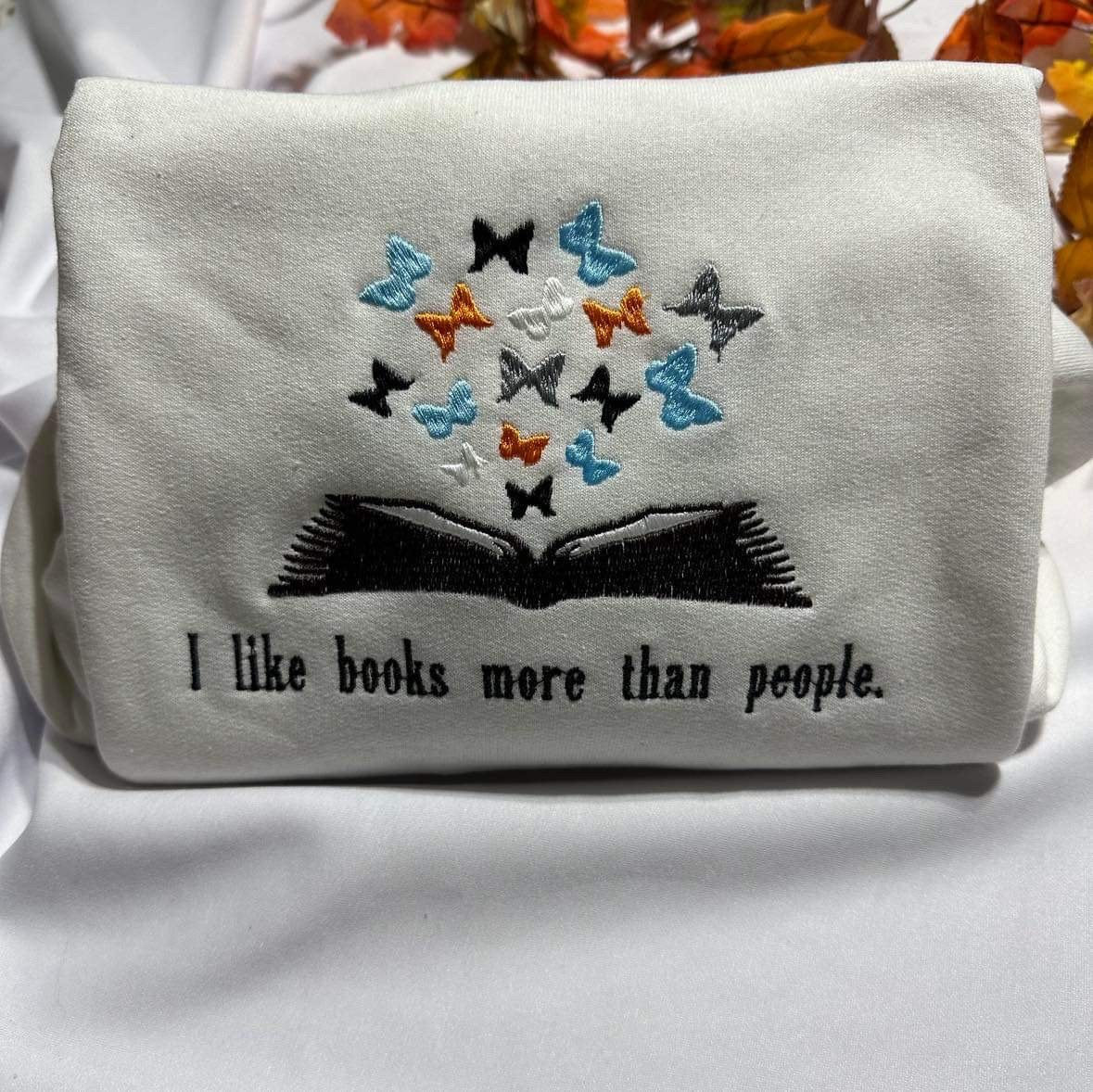 I like books more than people embroidered crewneck; butterflies book embroidered sweatshirt; book lover sweatshirt, butterfly bookish shirt