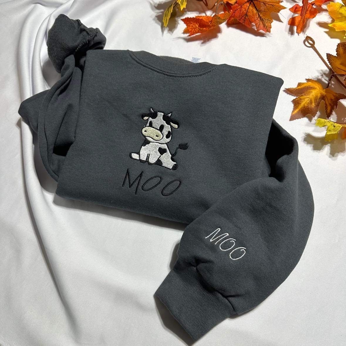 Cow embroidered Sweatshirt,  Sitting cow with MOO embroidered on the cuff of the crewneck, Christmas Fall aesthtic shirts