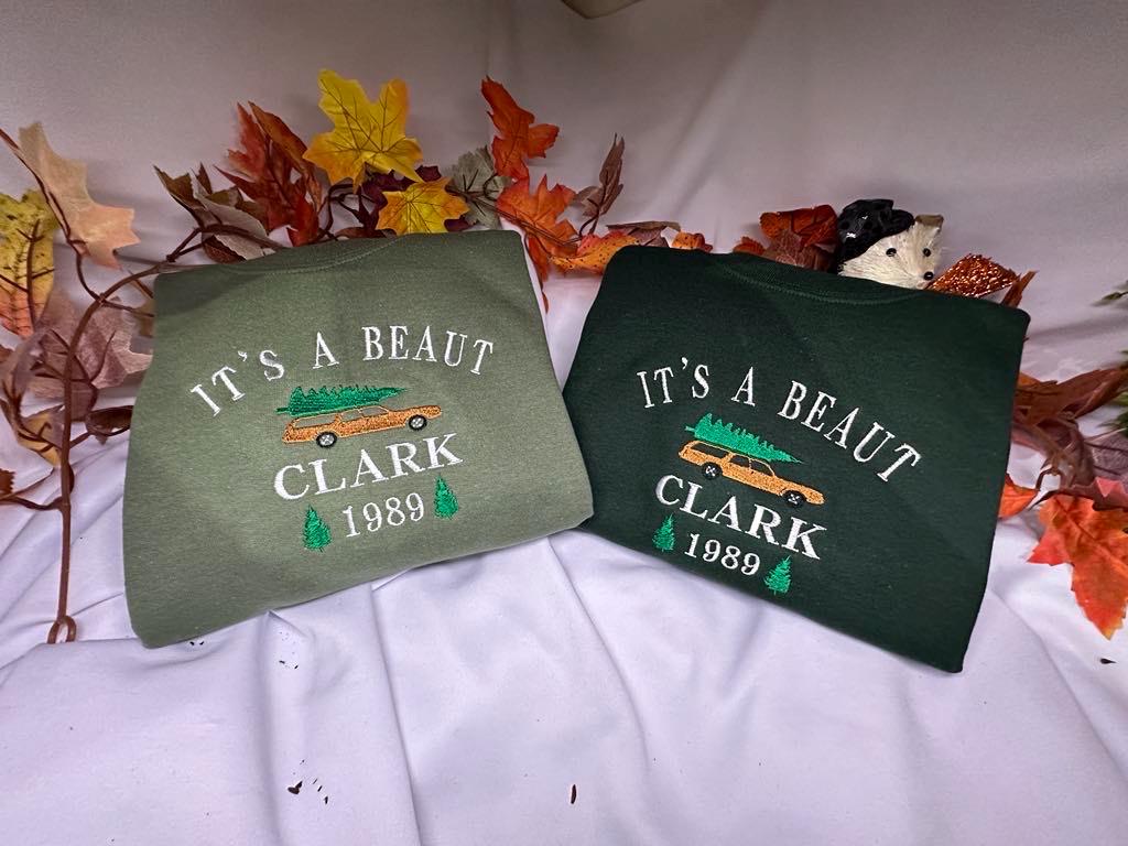 It's a Beaut Clark Embroidered Christmas Sweatshirt