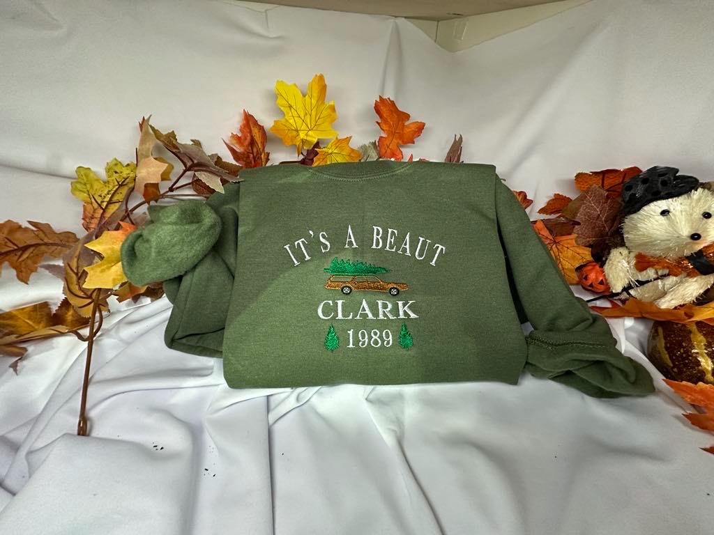 It's a Beaut Clark Embroidered Christmas Sweatshirt