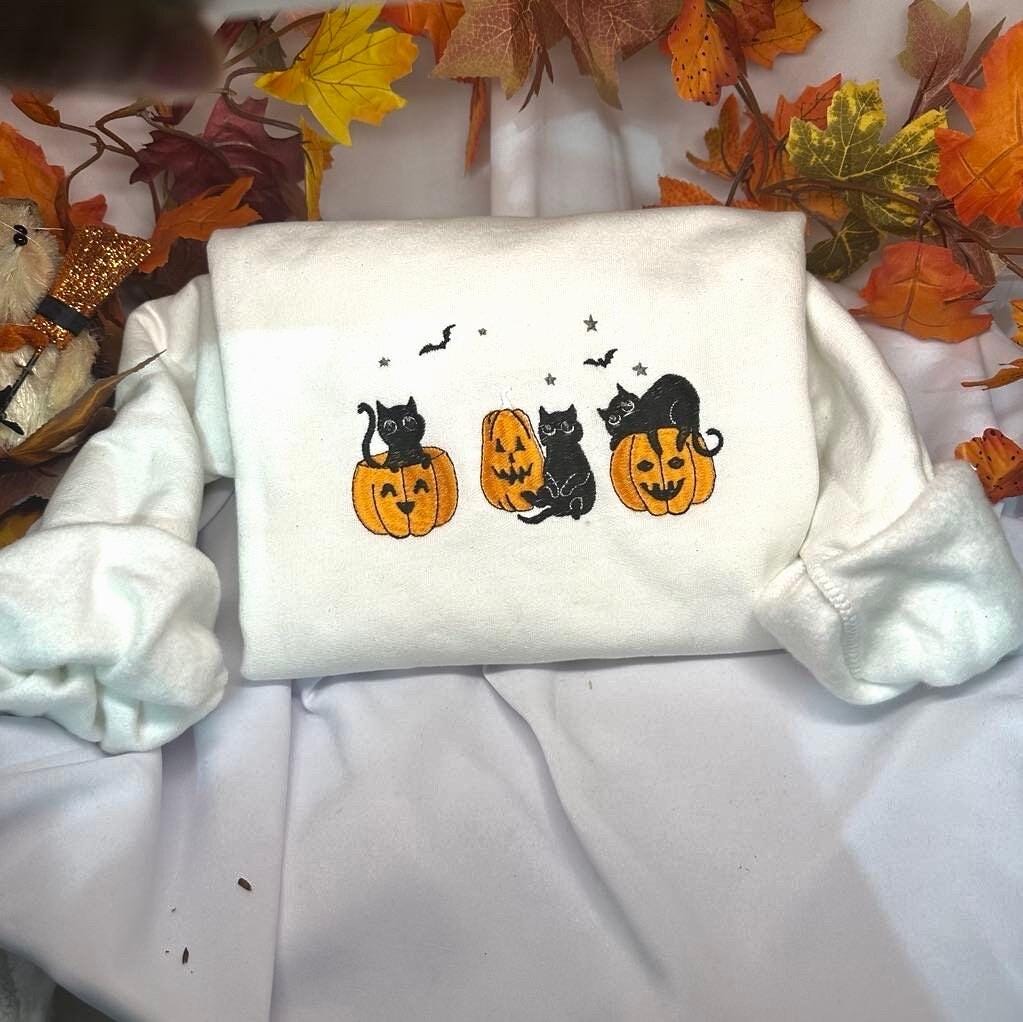Embroidered Black Cat Halloween Sweatshirt: Spooky Pumpkin Crewneck