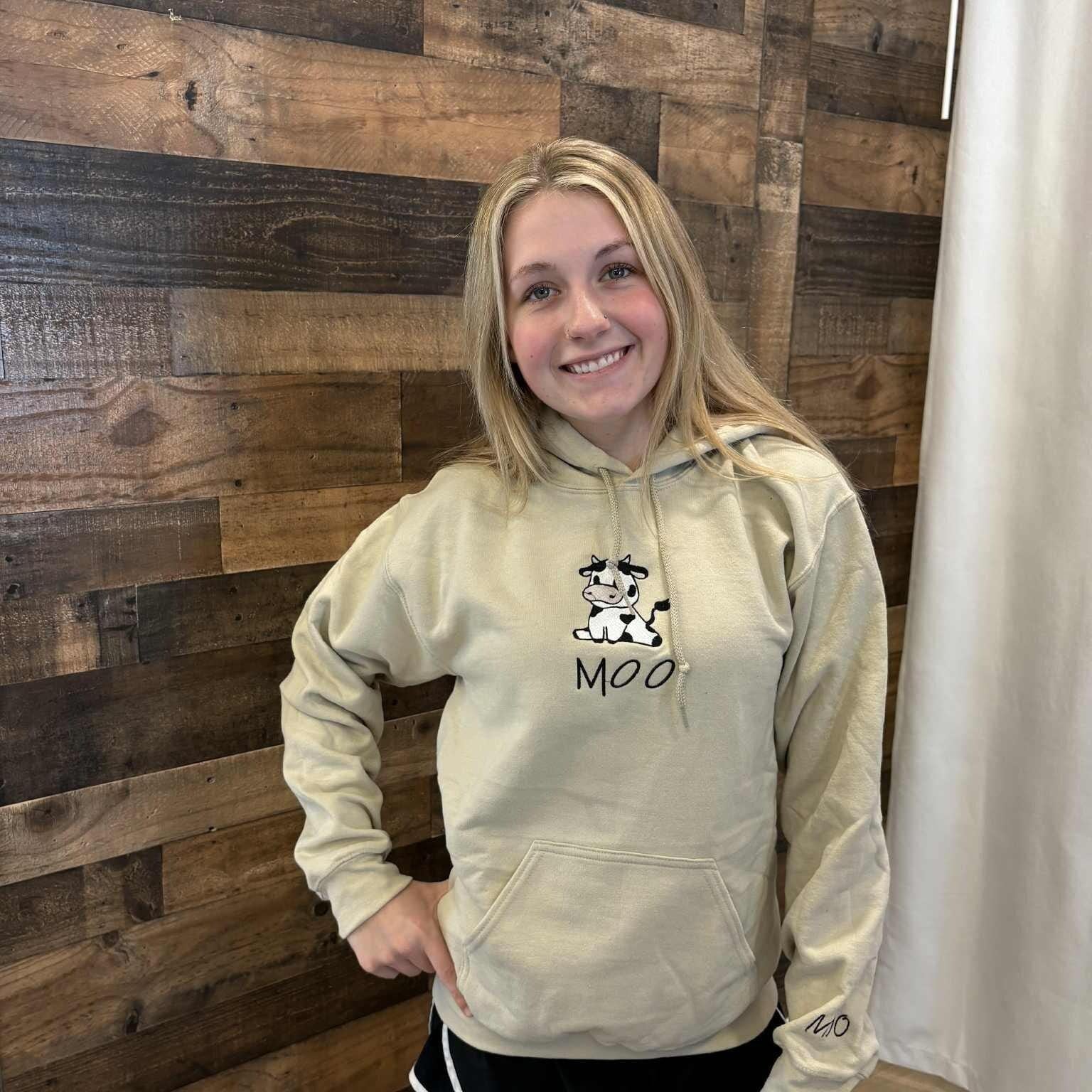 Cow Embroidered Hoodie: Funny Cartoon Sweatshirt, "MOO" Cuff